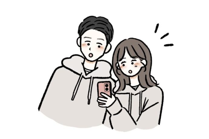 スマートフォンで情報を確認する男女のイラスト